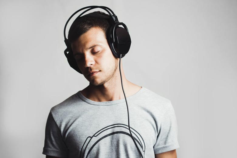 Man with closed-back headphones