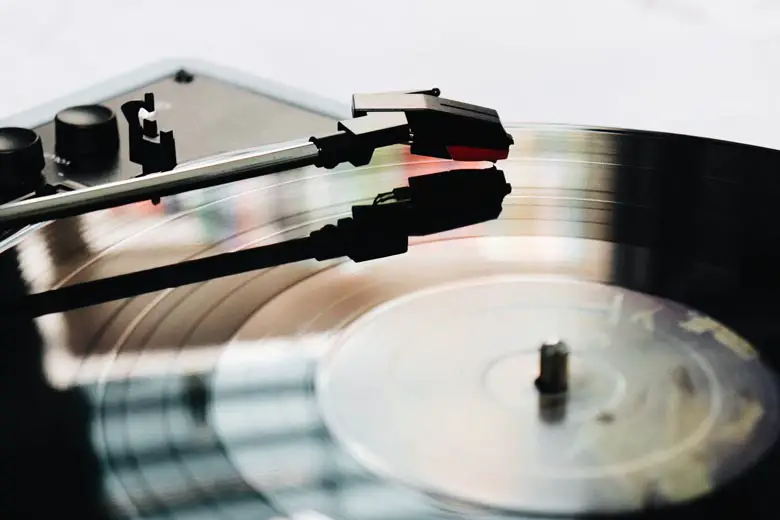 Playing vinyl record on turntable